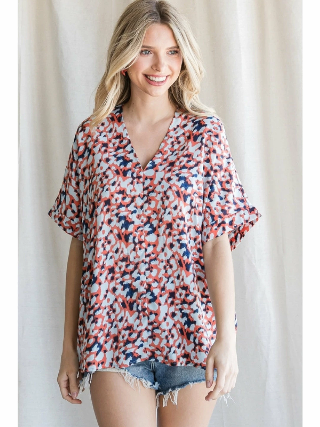 Jodifl Orange Mix Leopard V Neck Top New Arrivals 1 Jodifl Orange Mix Leopard V Neck Top New Arrivals